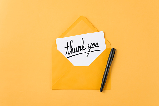 Opened envelope with thank you message